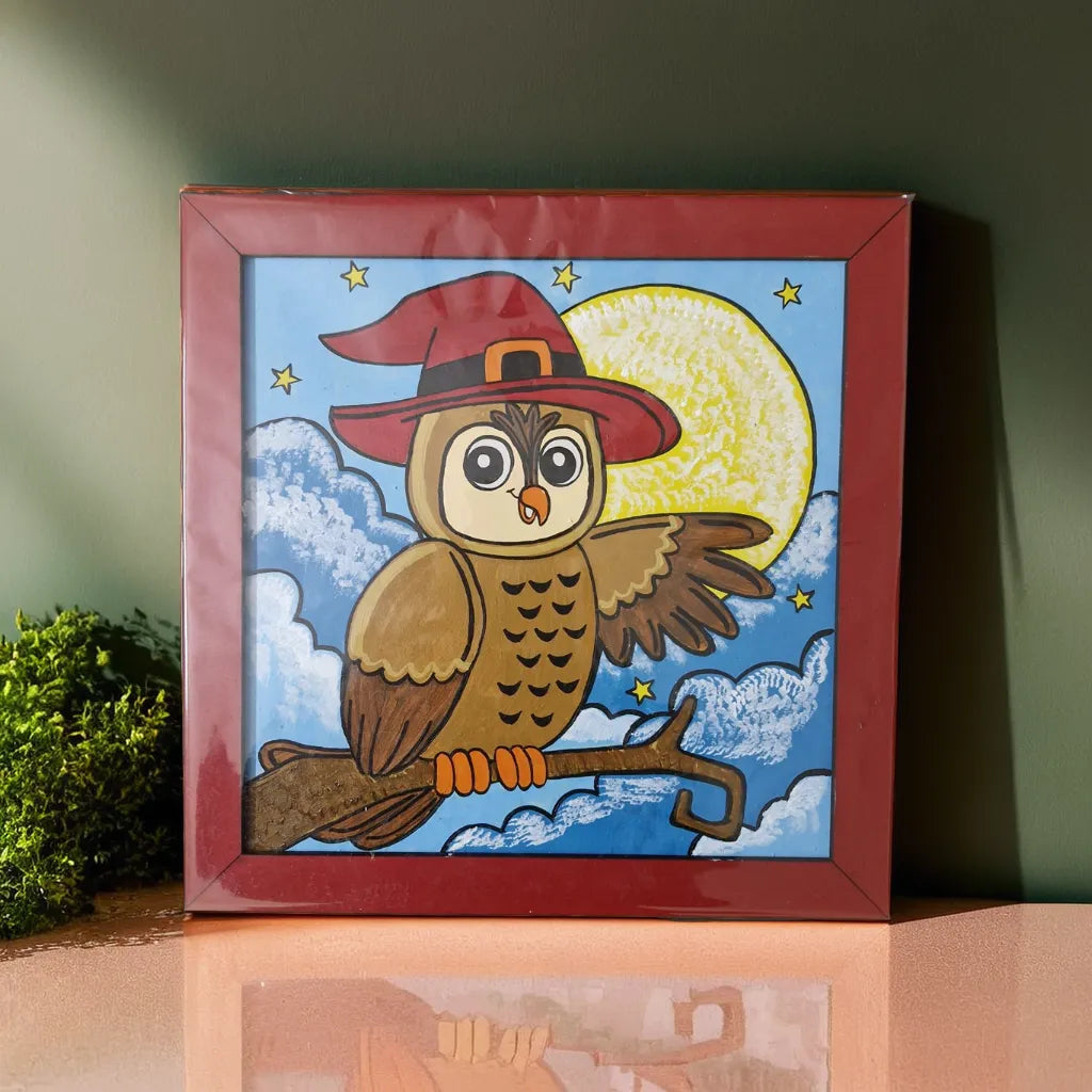 owl painting with red frame