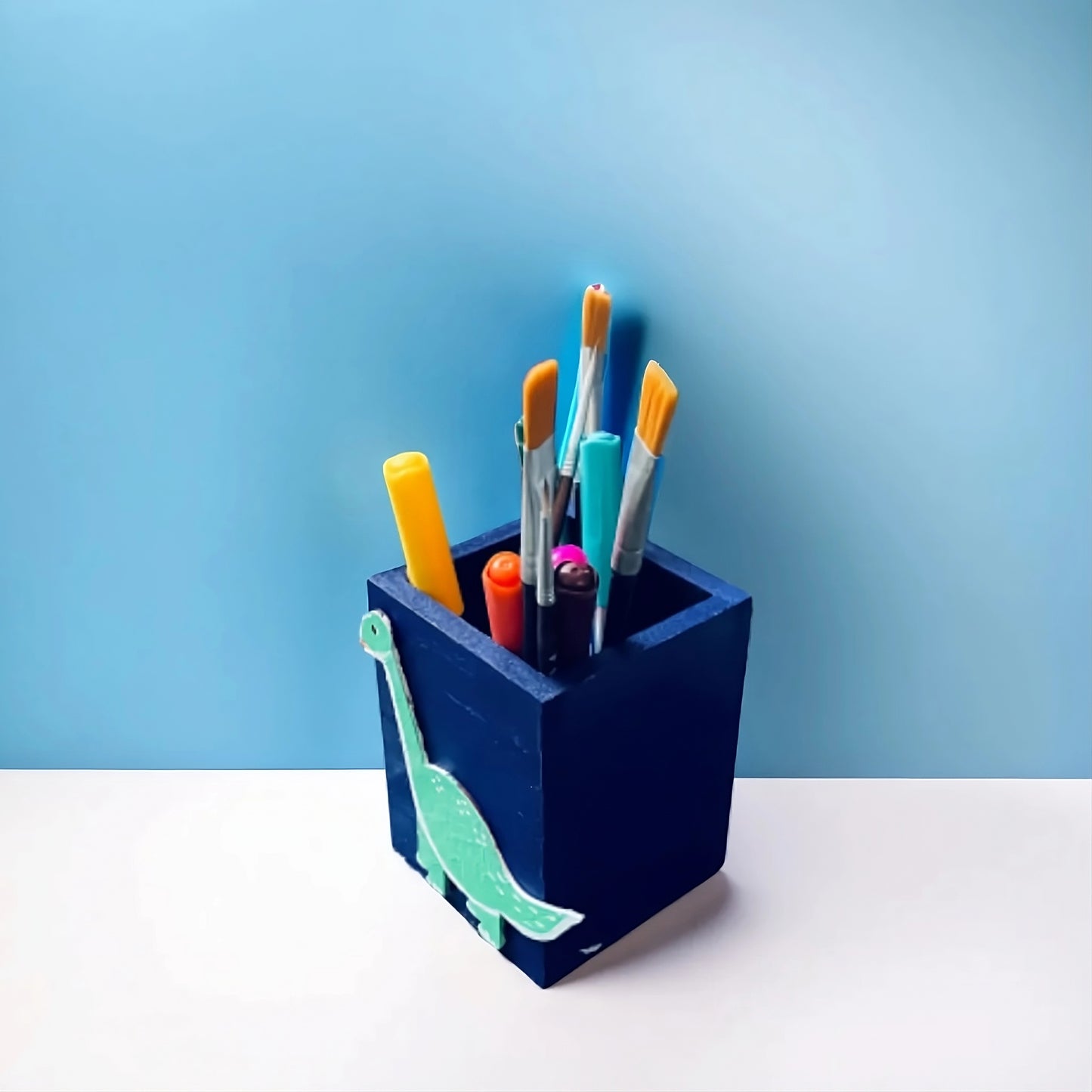 Dino pen stand