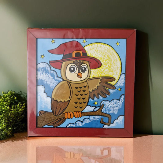 owl painting with red frame